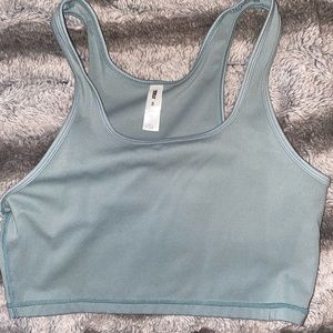 STAX x Jasmine Hand collection tank top in the color pistachio. Size small